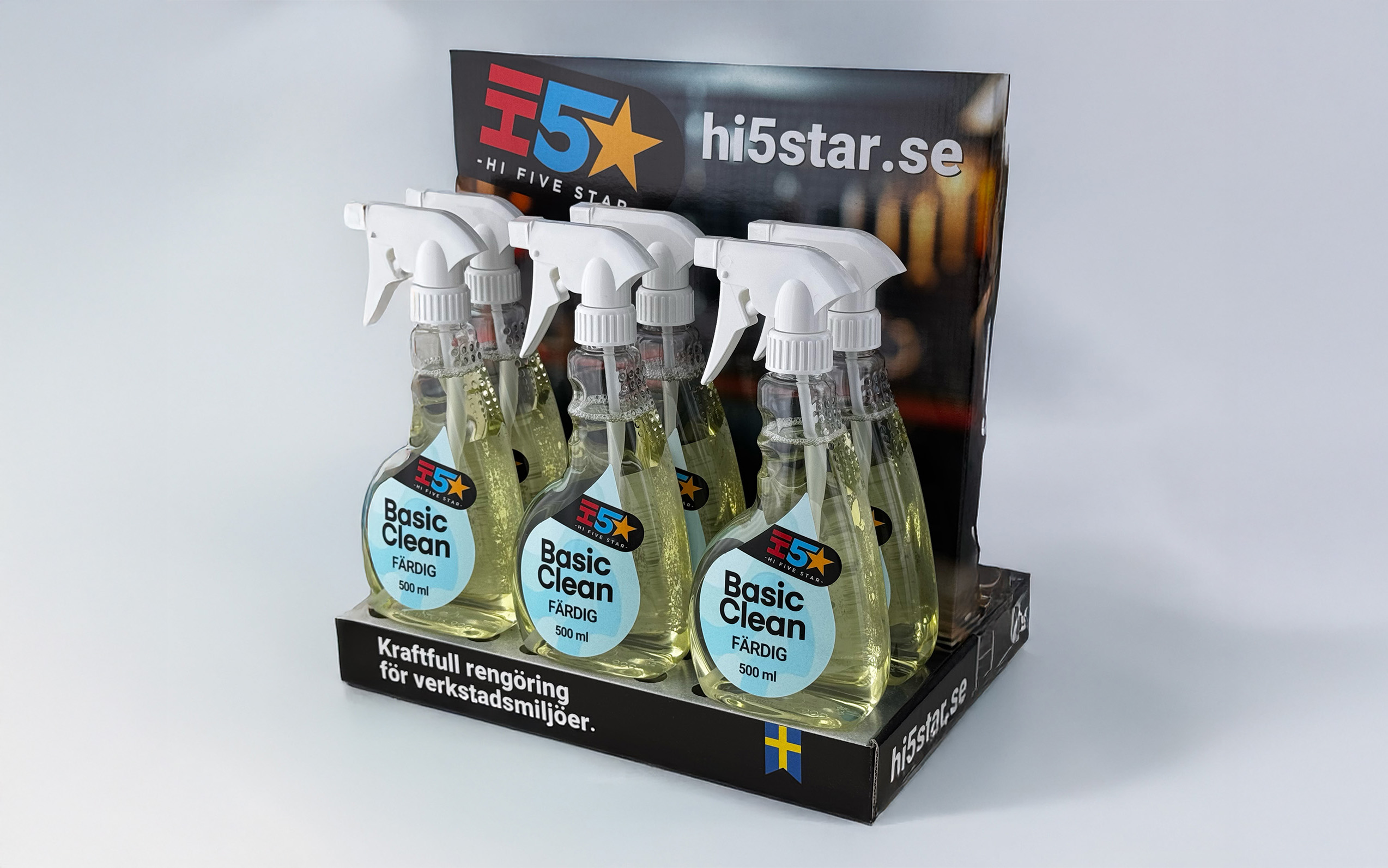 se duchflaskor med lösningsmedel i ett exponeringsställ